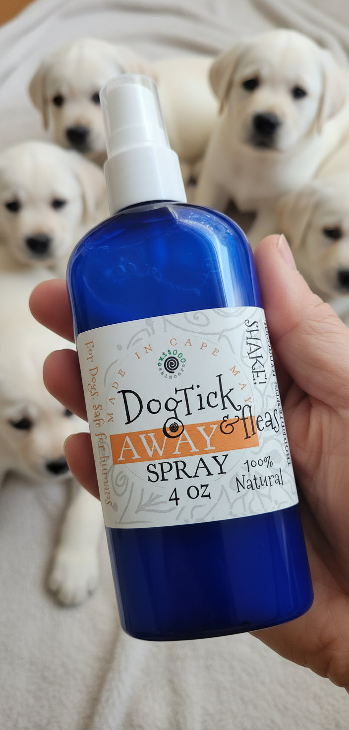 Bottle of Dogtick Away spray held by a person