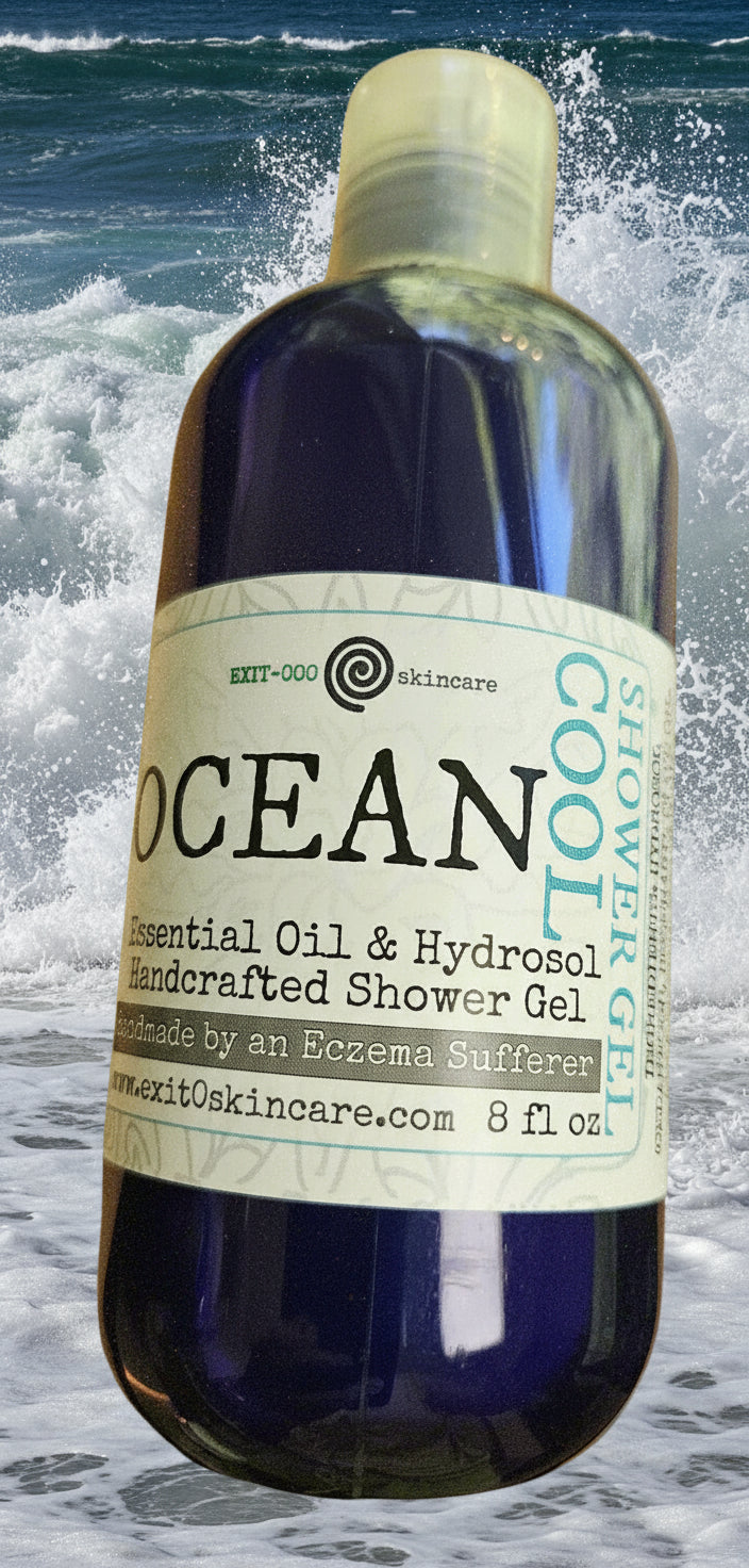 Bottle of 'Ocean' essential oil blend with herb hydrosol shower gel with a label on a neutral background