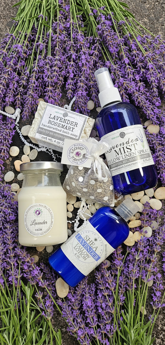 Collection of small bottles with labels on a dark surface