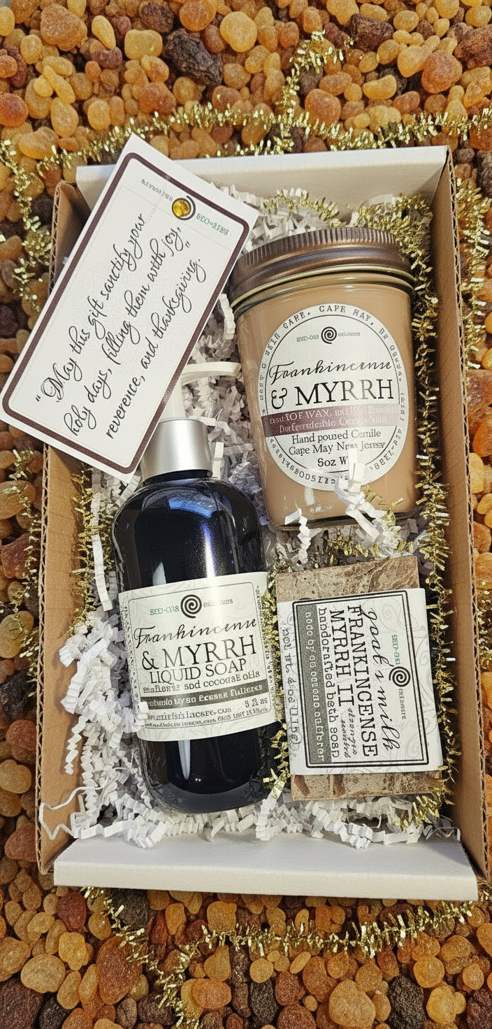 Two bottles of Frankincense Myrrh with a card inside a box
