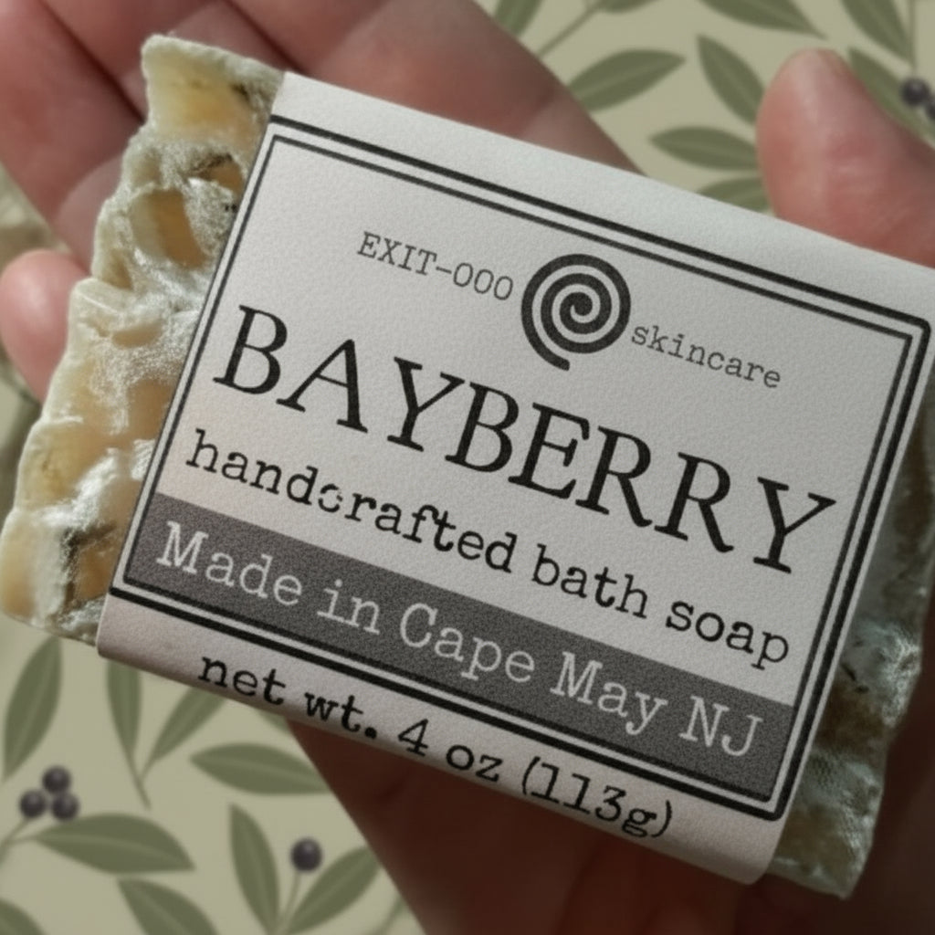 Handcrafted bath soap bar labeled 'Bayberry' held by a person