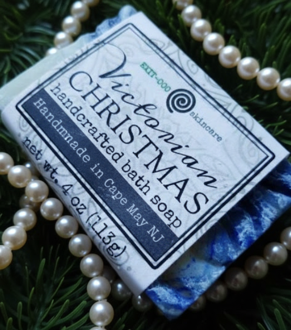 A packaged bar of soap labeled 'Victorian Christmas Eczema Bath Soap' with a Christmas-themed design on the wrapping.
