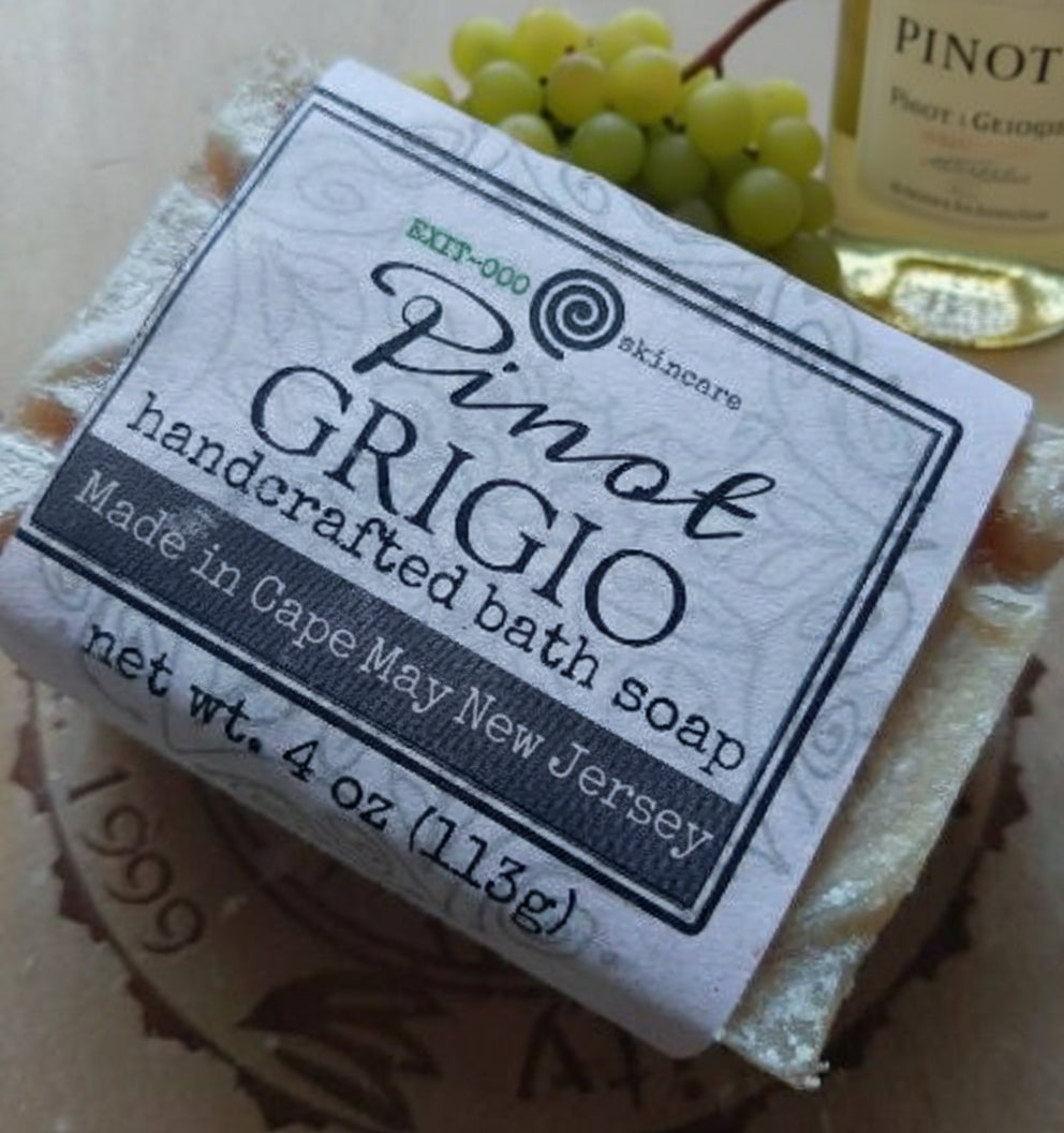 A packaged bar of 'Pinot Grigio' handcrafted bath soap with labeling that mimics a wine bottle label.